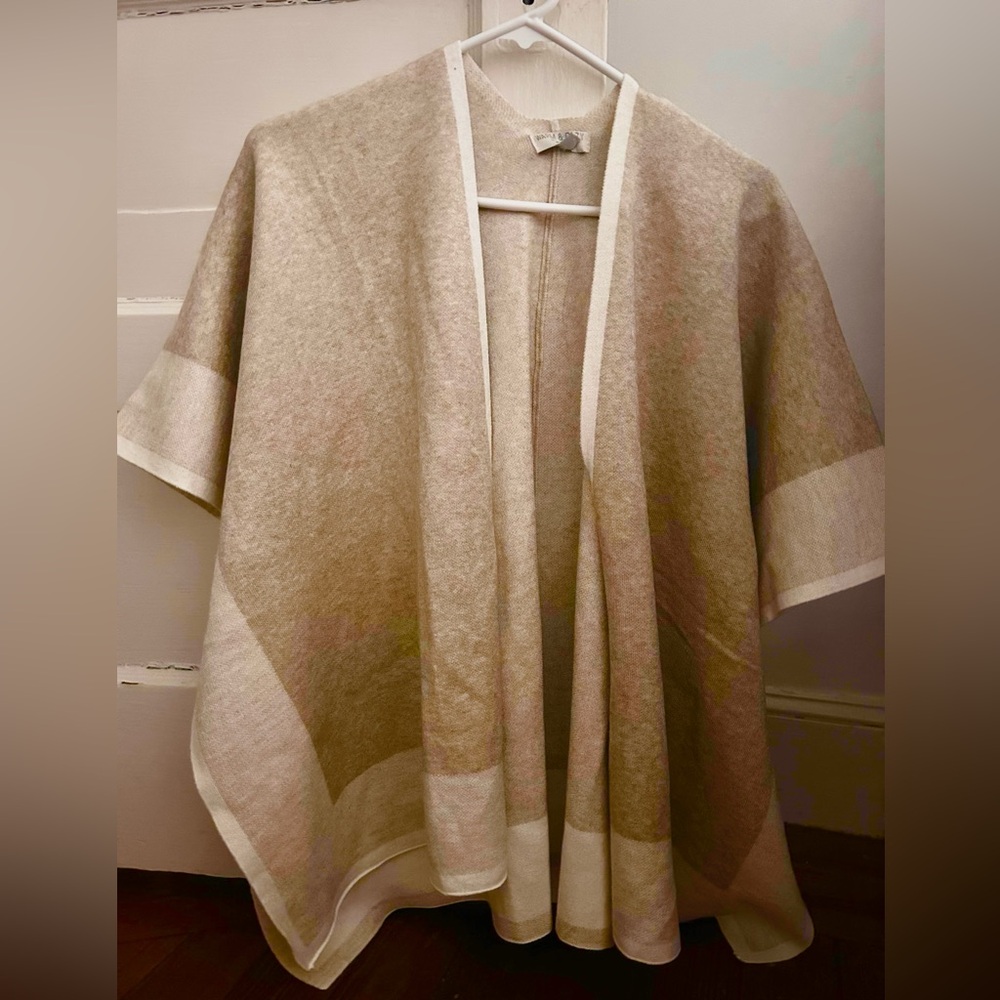 Warm and cozy lifestyle by Poof knit, poncho, shawl, tan and cream small